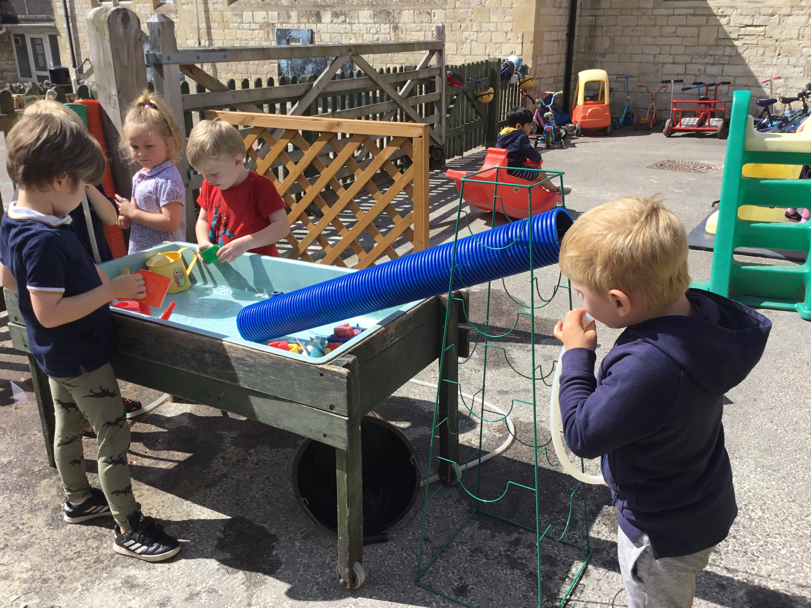 Image of children playing with water