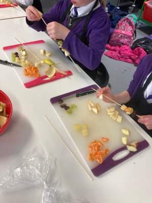 Cookery club made rainbow fruit skewers today! We learnt how to cut fruit safely using the bridge method and cut up grapes, pear, apple, banana, pineapple and satsuma for our rainbow fruit skewers. They look delicious!